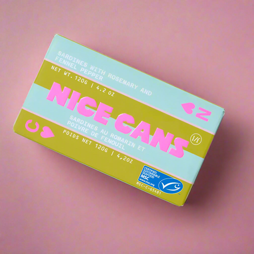 Box of 'Nice Cans' with pink and green design on a white background