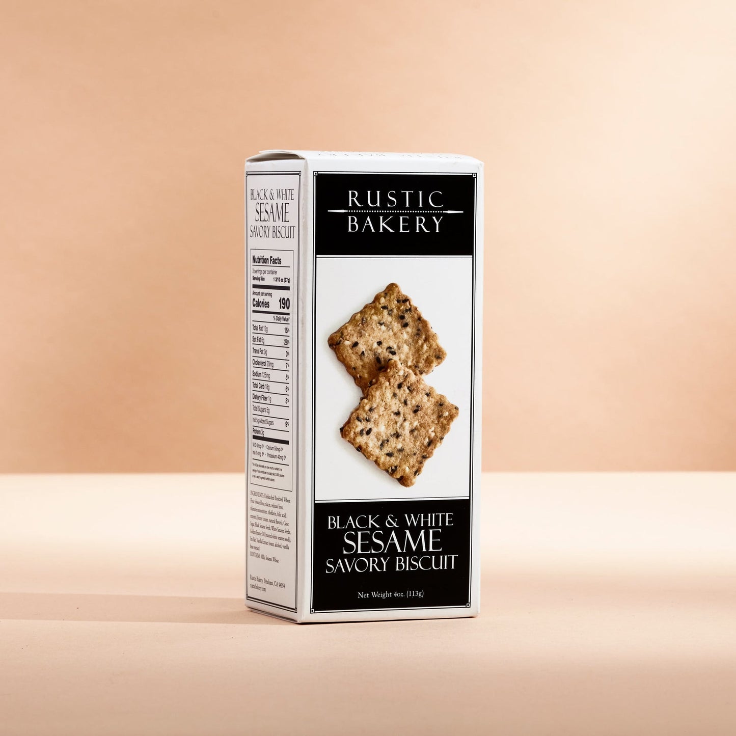 Box of Rustic Bakery Black & White Sesame Savory Biscuit on a beige background