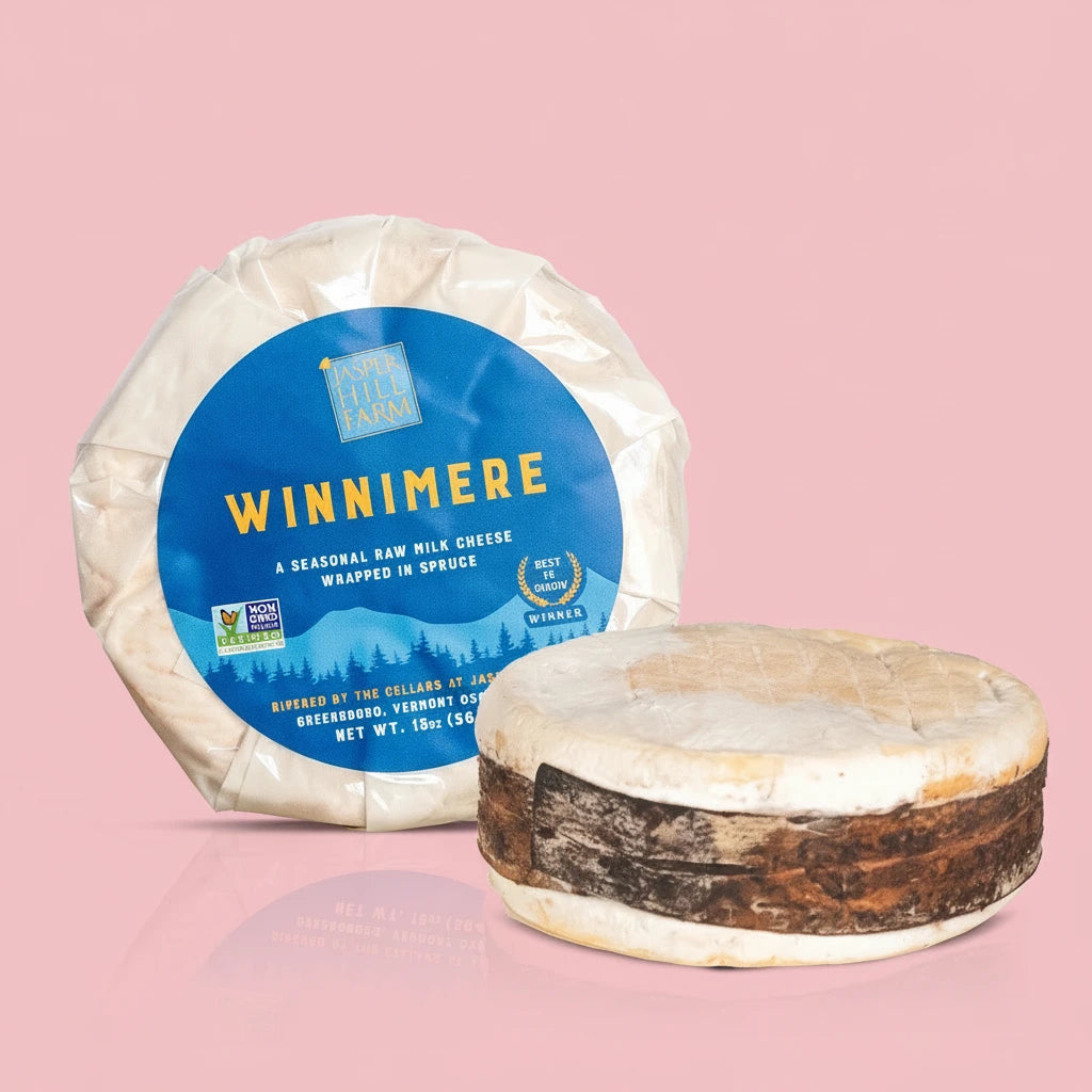 Winnimere cheese with a blue label on a white background